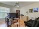 Bright home office features built-in shelving and ample workspace at 11507 Whispering Hollow Dr, Tampa, FL 33635