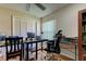 Spacious home office with two work stations and hardwood floors at 11507 Whispering Hollow Dr, Tampa, FL 33635