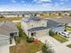 Two-story house with solar panels and landscaped yard at 11654 Stone Pine St, Riverview, FL 33569