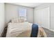 Bright bedroom with double bed and large closet at 11654 Stone Pine St, Riverview, FL 33569