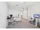 Home office with desk, chair, and ample storage at 11654 Stone Pine St, Riverview, FL 33569
