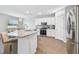 Modern kitchen with stainless steel appliances and granite countertops at 11654 Stone Pine St, Riverview, FL 33569