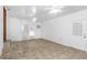 Finished basement with tiled floor and double doors at 1619 E Nome St, Tampa, FL 33604