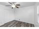 Spacious bedroom with double doors and ceiling fan at 1619 E Nome St, Tampa, FL 33604