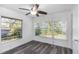 Bright bedroom with large windows and window blinds at 1619 E Nome St, Tampa, FL 33604
