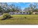 Ranch-style house with a large yard at 1619 E Nome St, Tampa, FL 33604