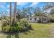 Ranch-style house with a large yard at 1619 E Nome St, Tampa, FL 33604