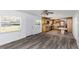 Open kitchen boasting wood cabinets, granite countertops and tile floors at 1619 E Nome St, Tampa, FL 33604
