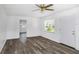 Living room with grey flooring and access to another room at 1619 E Nome St, Tampa, FL 33604