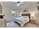 Bright bedroom with a king-size bed and coastal decor at 17219 Scuba Crest St, Wimauma, FL 33598