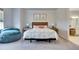 Bedroom with a queen-size bed and ensuite bathroom access at 17219 Scuba Crest St, Wimauma, FL 33598