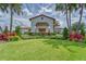 Community clubhouse exterior with landscaping at 17219 Scuba Crest St, Wimauma, FL 33598