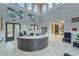Bright and spacious community lobby with reception at 17219 Scuba Crest St, Wimauma, FL 33598