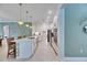 Open concept kitchen with island and breakfast bar at 17219 Scuba Crest St, Wimauma, FL 33598
