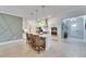 Open concept kitchen with island and view of entryway at 17219 Scuba Crest St, Wimauma, FL 33598