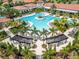 Community pool with expansive deck and relaxing lounge areas at 17219 Scuba Crest St, Wimauma, FL 33598