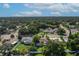 Wide aerial view showcasing the home and neighborhood at 1742 Bayshore Blvd, Dunedin, FL 34698