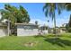 Backyard view showcasing a shed and gazebo at 1742 Bayshore Blvd, Dunedin, FL 34698