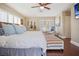 King-size bed, hardwood floors, and plenty of natural light at 1742 Bayshore Blvd, Dunedin, FL 34698