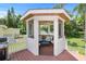 Screened-in gazebo on deck, ideal for outdoor relaxation at 1742 Bayshore Blvd, Dunedin, FL 34698