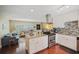 Updated kitchen with granite countertops and stainless steel appliances at 1742 Bayshore Blvd, Dunedin, FL 34698