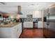 Modern kitchen featuring stainless steel appliances and granite countertops at 1742 Bayshore Blvd, Dunedin, FL 34698