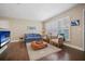 Bright and airy living room with hardwood floors and ample natural light at 1742 Bayshore Blvd, Dunedin, FL 34698