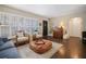 Spacious living area featuring hardwood floors and plantation shutters at 1742 Bayshore Blvd, Dunedin, FL 34698