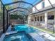 Relaxing pool and spa with waterfall feature at 2402 W Parkland Blvd, Tampa, FL 33609