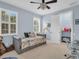 Charming bedroom with a daybed and built-in closet at 2607 Grand Lakeside Dr, Palm Harbor, FL 34684