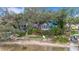 Aerial view of waterfront home and surrounding properties at 2886 Bay Shore Dr, Safety Harbor, FL 34695