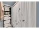 Bathroom with shower and linen closet at 2886 Bay Shore Dr, Safety Harbor, FL 34695