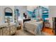 Cozy bedroom with built-in shelving and window seat at 2886 Bay Shore Dr, Safety Harbor, FL 34695