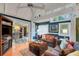 Cozy living room features a brown sofa and a wooden coffee table at 2886 Bay Shore Dr, Safety Harbor, FL 34695