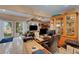 Home office with a large desk, computer, and built-in shelving at 2886 Bay Shore Dr, Safety Harbor, FL 34695
