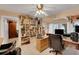 Home office with built-in bookshelves and lake views at 2886 Bay Shore Dr, Safety Harbor, FL 34695