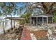 Overlooking the water, this property has old waterfront structures in need of repair at 2886 Bay Shore Dr, Safety Harbor, FL 34695