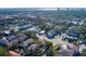 Aerial view of a home situated in a residential area with city views at 312 S Arrawana Ave, Tampa, FL 33609