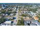 Aerial view of residential neighborhood, showcasing homes and tree-lined streets at 312 S Arrawana Ave, Tampa, FL 33609