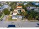 Aerial view showcasing a house's location in a neighborhood with surrounding homes and streets at 312 S Arrawana Ave, Tampa, FL 33609