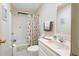 Bathroom with a tub, toilet, and vanity at 36900 Grace Ave, Zephyrhills, FL 33542