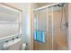 Bathroom with a shower, toilet, and vanity at 36900 Grace Ave, Zephyrhills, FL 33542