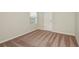 Spacious bedroom featuring neutral walls and carpet at 37306 Sagemoor Dr, Zephyrhills, FL 33541