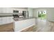 Modern kitchen with stainless steel appliances and an island at 37306 Sagemoor Dr, Zephyrhills, FL 33541