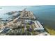 Aerial view of waterfront community with lush landscaping and private boat slips at 464 N Paula Dr # 220, Dunedin, FL 34698