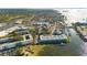 Wide aerial showcasing the property's waterfront location and surrounding area at 464 N Paula Dr # 220, Dunedin, FL 34698