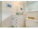 Clean bathroom with updated vanity and tiled flooring at 464 N Paula Dr # 220, Dunedin, FL 34698