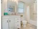Clean bathroom with updated vanity and shower/tub combo at 464 N Paula Dr # 220, Dunedin, FL 34698