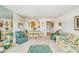 Elegant dining room with pass-through to kitchen at 464 N Paula Dr # 220, Dunedin, FL 34698