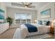 Spacious bedroom with a ceiling fan and blue accents at 4846 Sandy Glen Way, Wimauma, FL 33598